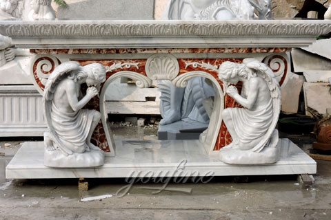 marble altar with praying angels in pairs 